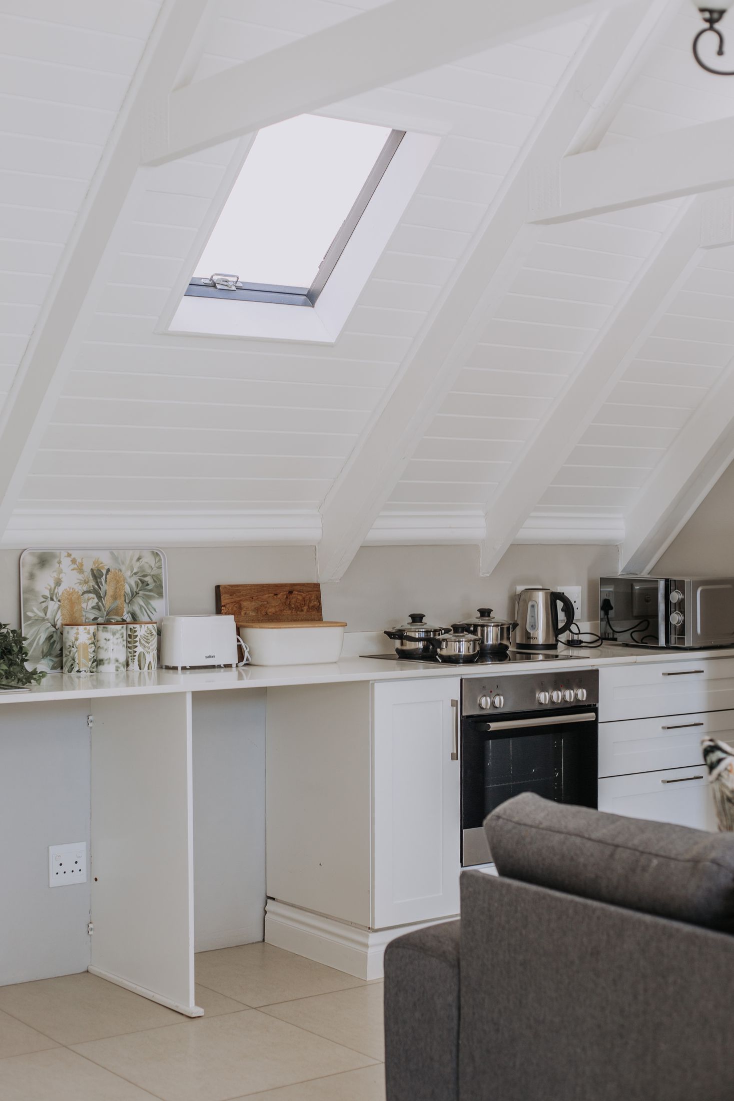 The loft kitchen under a skylight