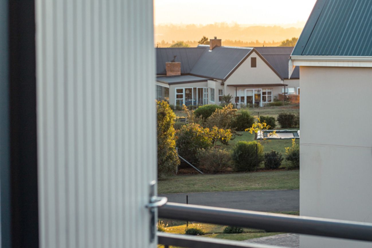 The view from a loft balcony across the estate in the evening light
