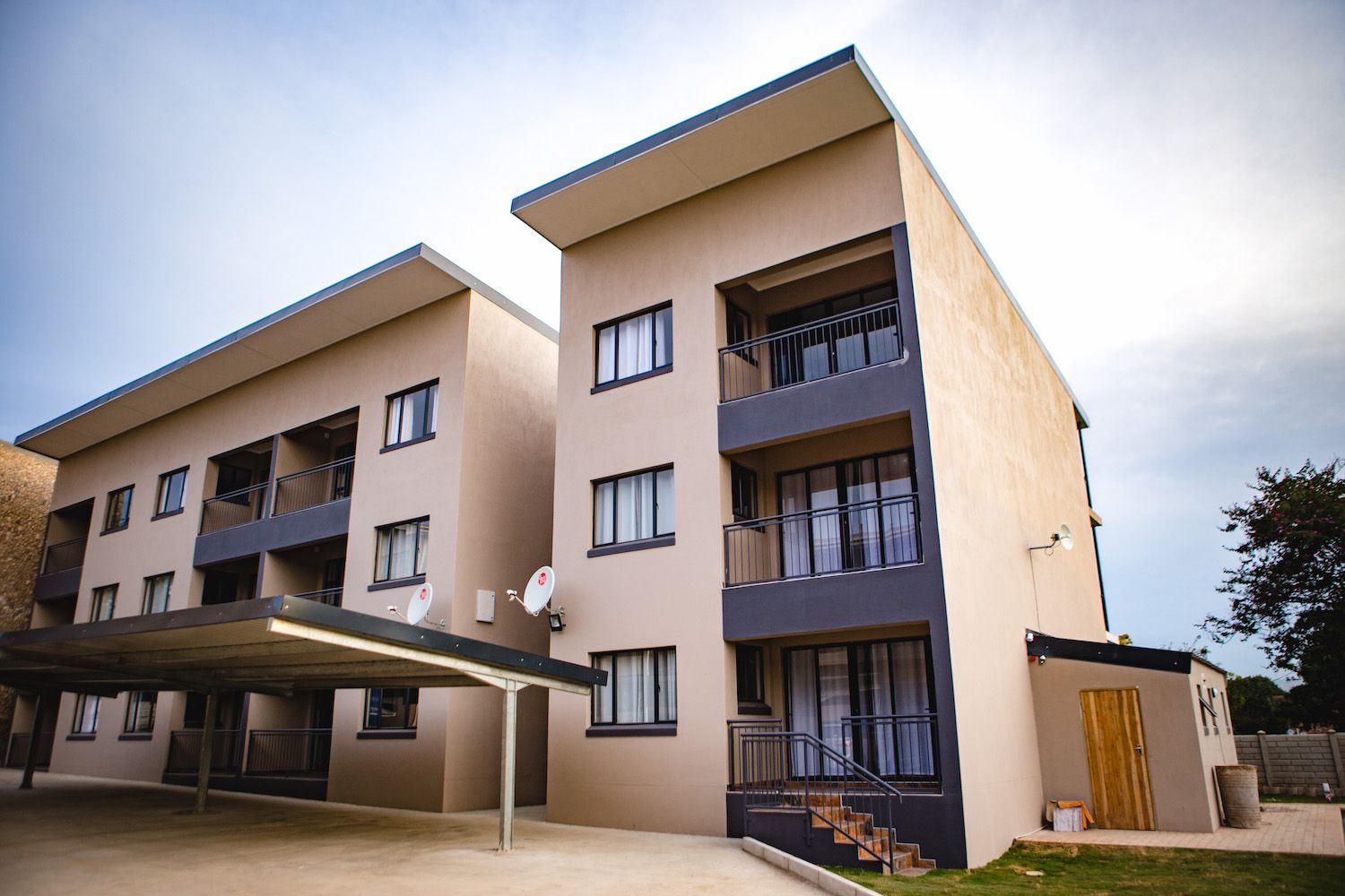 The Wenvic apartment block, three floors with balconies and covered parking